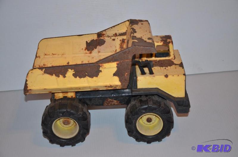 lot 239 image: Tonka dump truck 12" long...