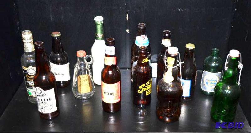 lot 40 image: 13 vintage glass beer bottles - Smoothis Root...