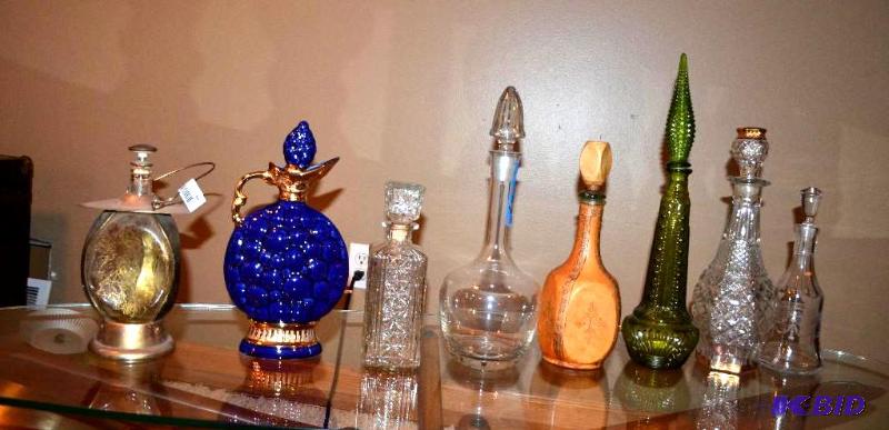 lot 64 image: 8 decanters the tallest is 19"...