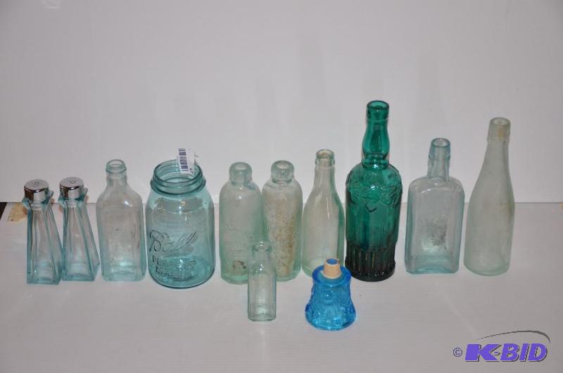 lot 67 image: Antique glass bottles  Bosch, Scotts Emulsio...