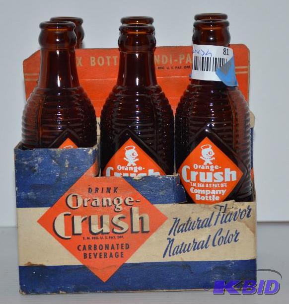 lot 81 image: Vintage 6 pack of Orange Crush bottles...