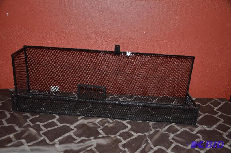 lot 84 image: Black wire shelf that was used in a bar to ho...