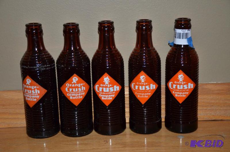 lot 90 image: 5 vintage Orange Crush bottles...