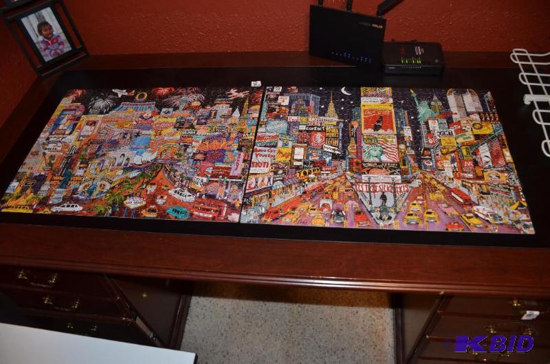 lot 94 image: 2 puzzles - Times Square World Series 1977, L...