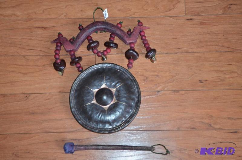 lot 12 image: Metal gong made in Thailand 9" diameter...