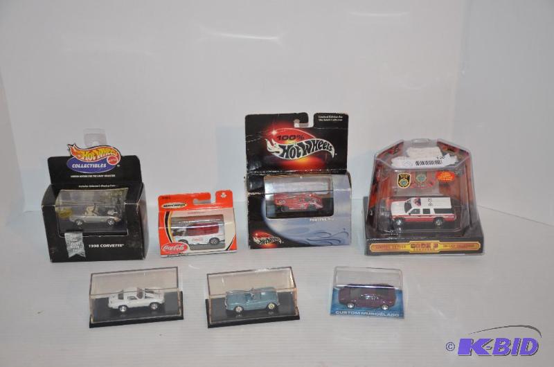 lot 120 image: 7 collectible Hot Wheels - Code 3 Suburban, C...
