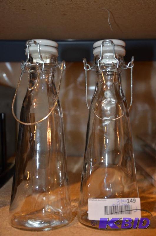 lot 149 image: Antique glass milk jugs 8" tall...