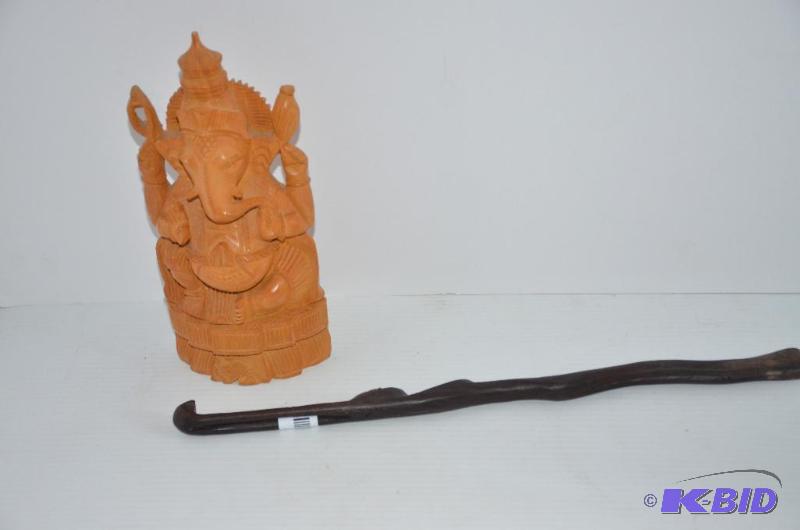 lot 16 image: Two wooden statues made in Thailand. 10"...