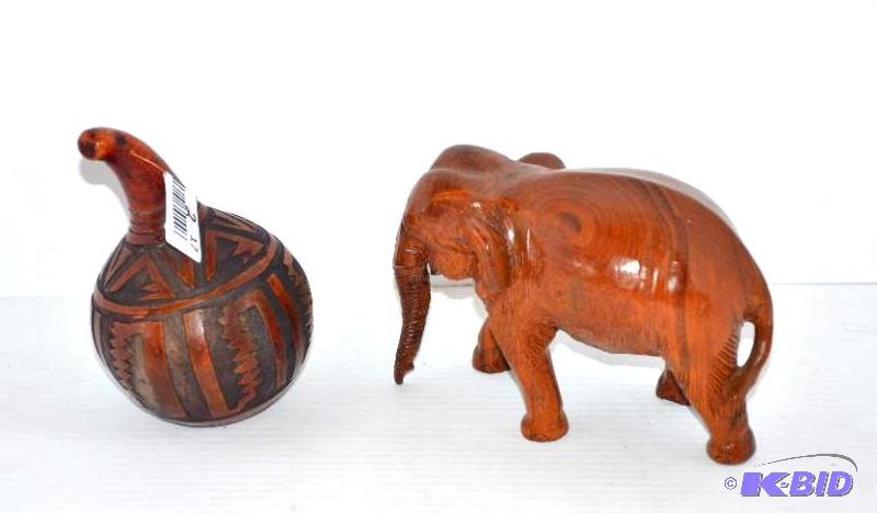 lot 17 image: Wooden rattle 6" tall. An elephant 7&quo...
