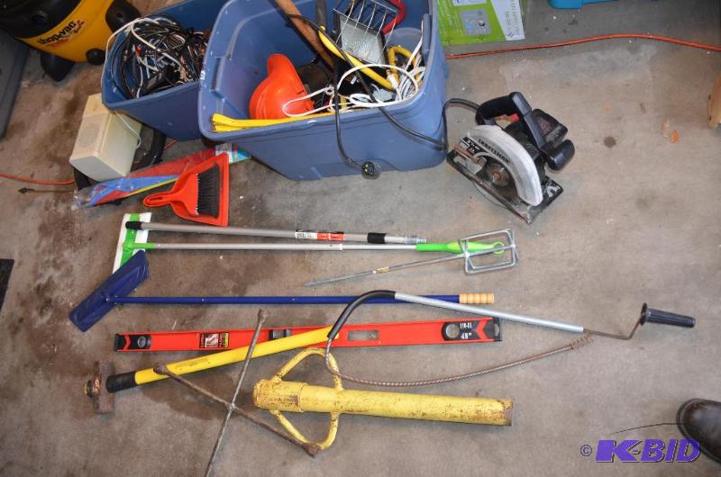 lot 185 image: Tools - sewer snake, level, post driver, Craf...