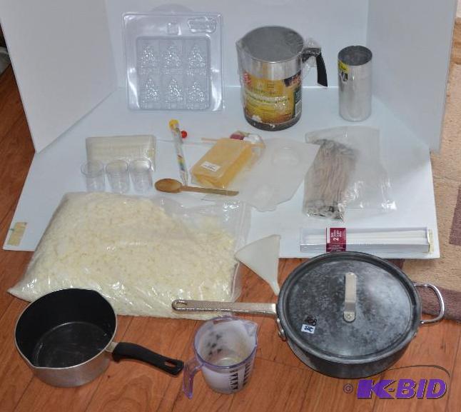 lot 208 image: Candle making kit, bag of wax, molds...