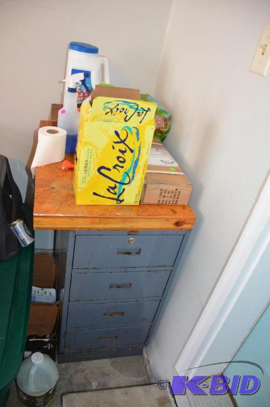 lot 218 image: Metal file cabinet with wood work bench top...