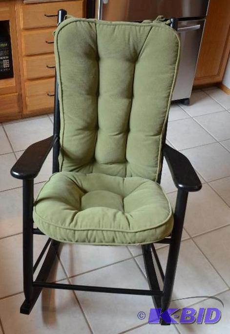 lot 225 image: Wood rocking chair with cushions....