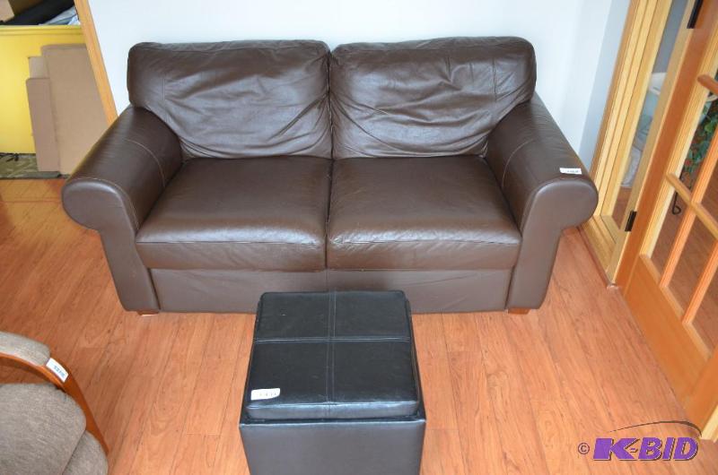 lot 25 image: Chocolate Brown leather Love seat.   70"...