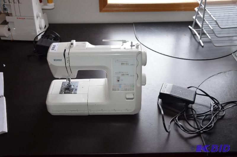lot 42 image: Kenmore sewing machine. Model 38516126200....
