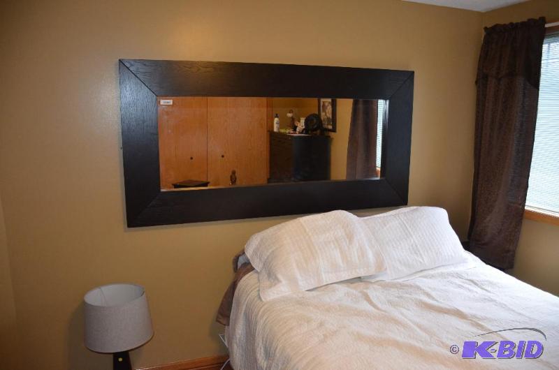 lot 45 image: Wood framed mirror. 75" x37"...