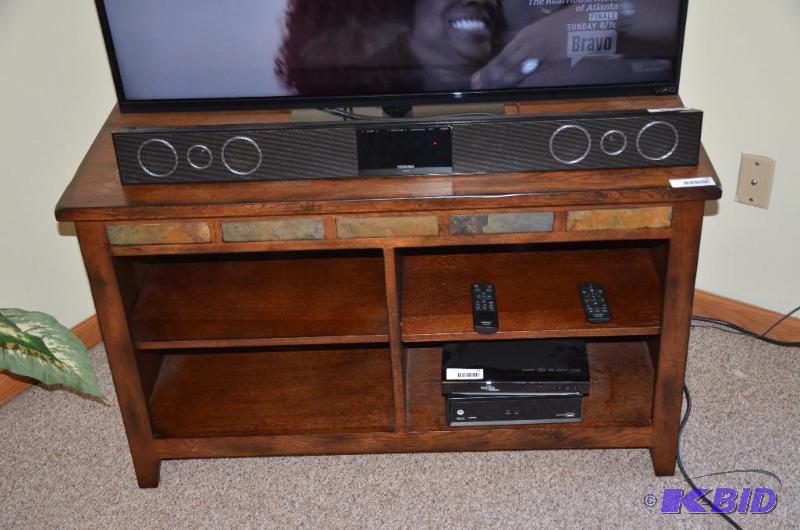 lot 58 image: Wood TV stand with adjustable shelves. 43&quo...