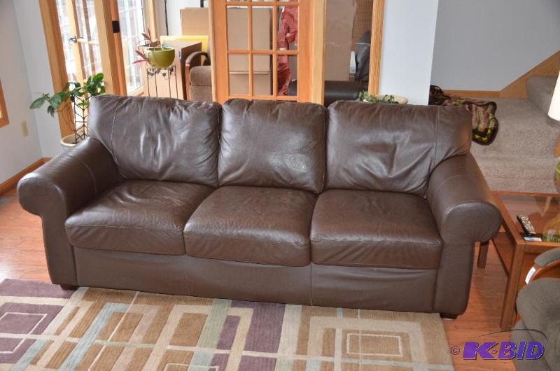 lot 7 image: Chocolate brown leather couch. 84&quotx32&qu...