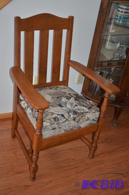 lot 8 image: Antique solid Oak Chair. Sturdy. The back is ...