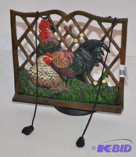 lot 97 image: cast iron cookbook holder 9" tall...