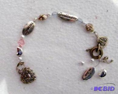 lot 34 image: Charm Bracelet - &quotSpecial" &quotLo...