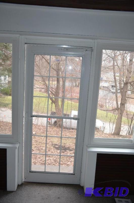 lot 38 image: 36" Aluminum storm door...