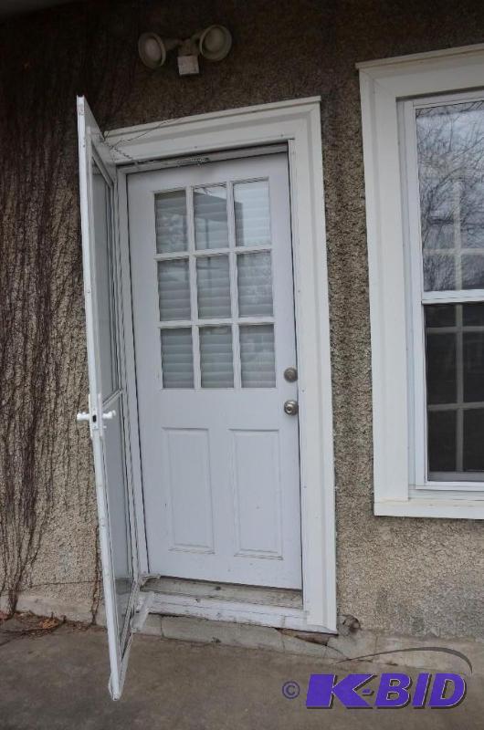 lot 94 image: Wood Door 32" and aluminum storm. Does n...