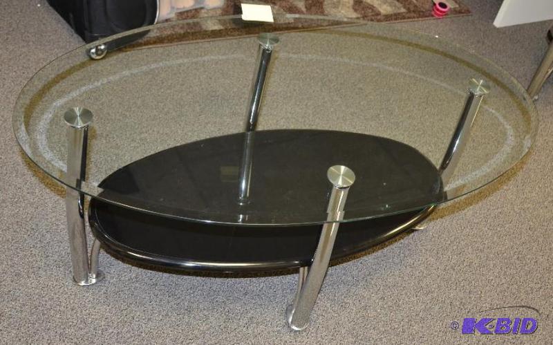 lot 110 image: Glass top coffee table 28&quotX 46" X 2...