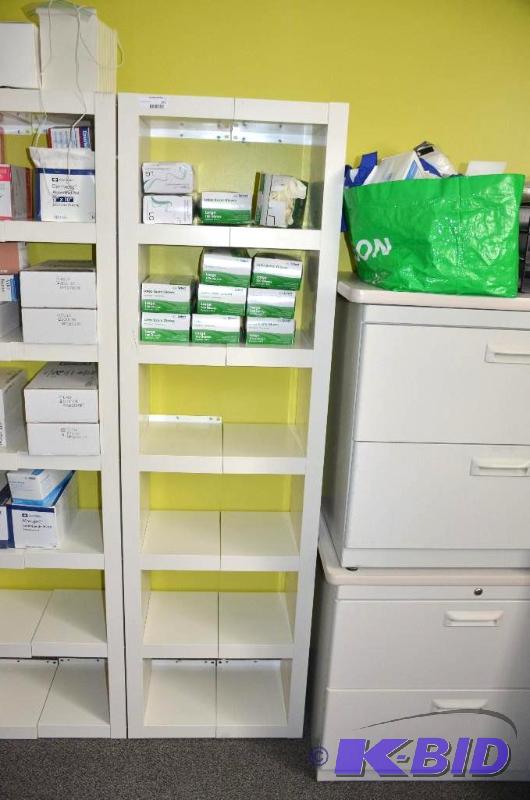 lot 142 image: White storage shelves attached to wall may be...