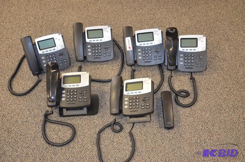 lot 167 image: Four Digium phones model D40 with one extra h...