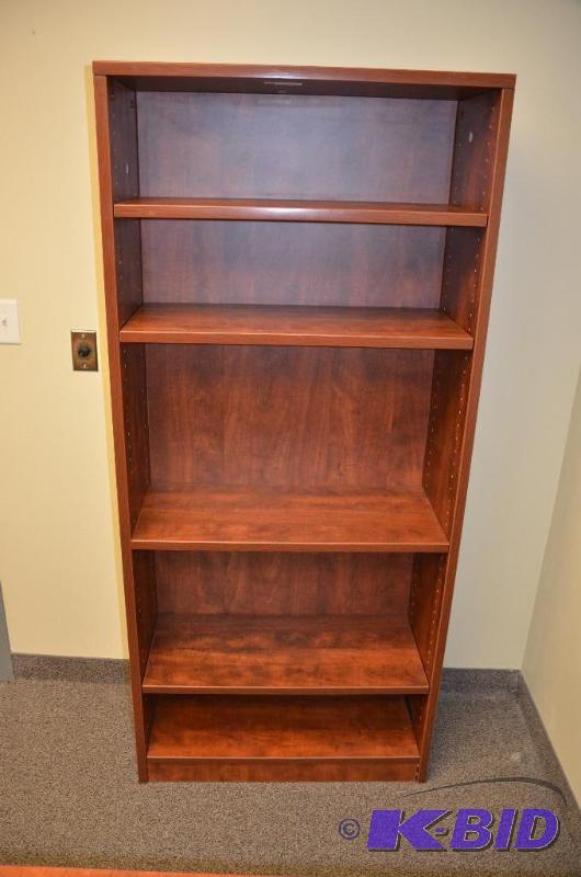 lot 17 image: High end wood bookcase with adjustable shelve...