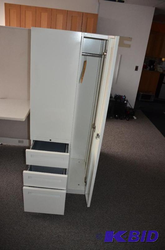 lot 225 image: White metal cabinet with shelving, hanger com...