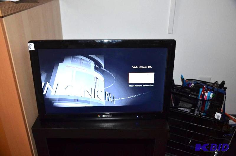 lot 240 image: Polaroid 22" LCD TVDVD player with wall...