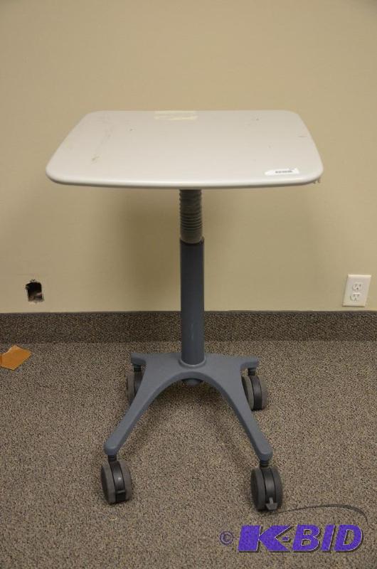 lot 264 image: Adjustable rolling table 17&quotx21.5"...