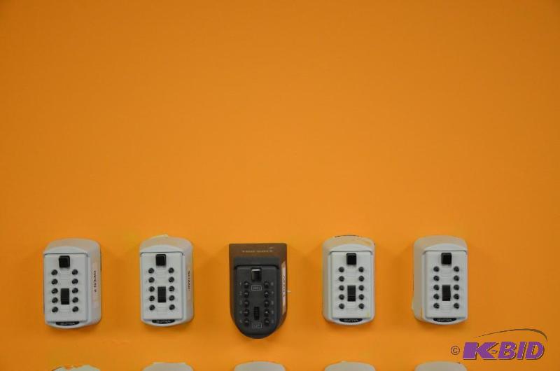 lot 28 image: 4 white key lock boxes...