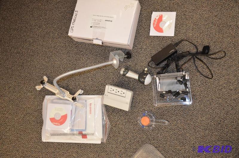 lot 285 image: AC Adapter, Brackets, and cds...