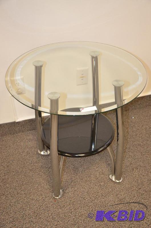lot 86 image: Glass top table with chrome base 26 diameter ...
