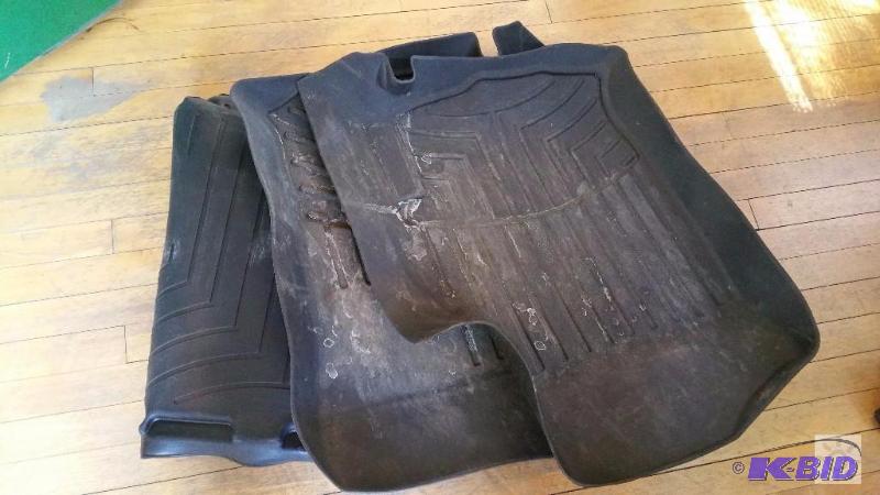 lot 1 image: Weather Tec. Floor mats