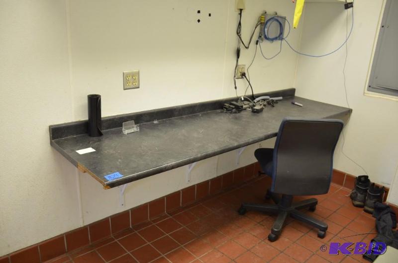 lot 29 image: Counter top and chair. 25" x 96 12&quo...