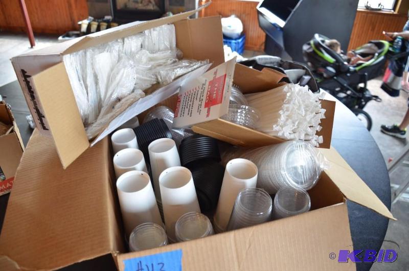 lot 43 image: Box of cups, straws, plastic ware and lids...