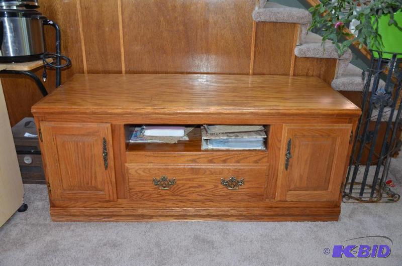lot 12 image: Oak wood bench with storage 56x24x24"...