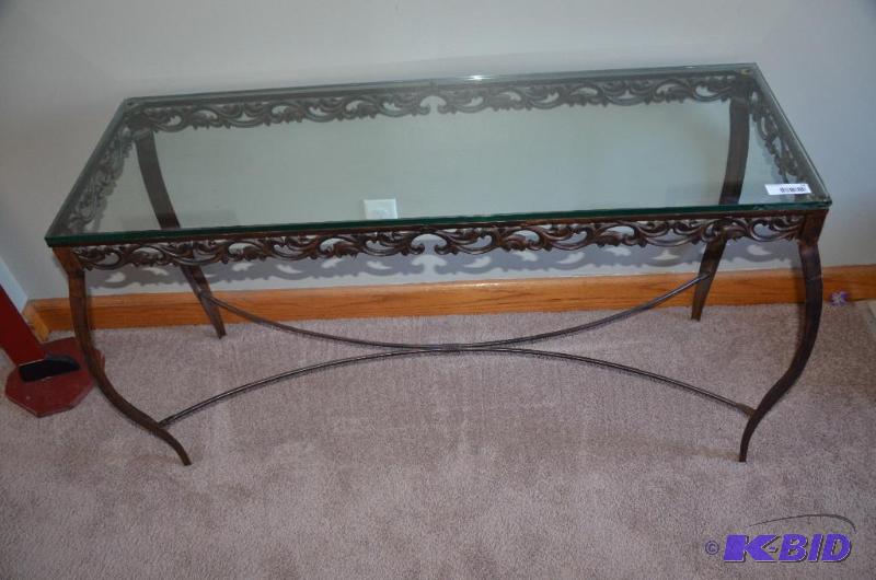 lot 13 image: Wrought iron glass top table 50x17x28...