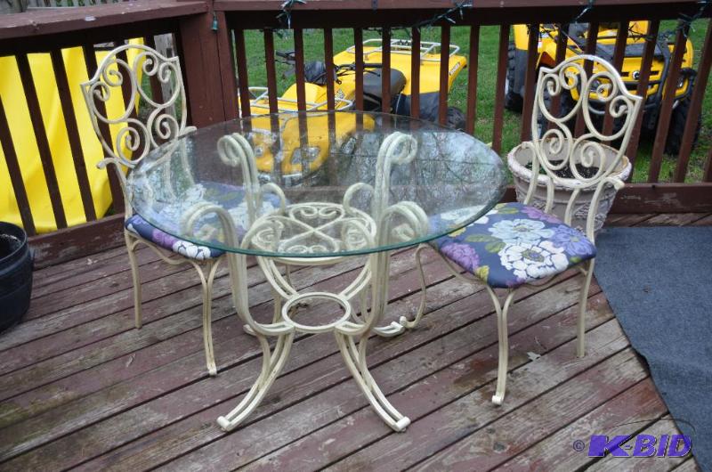 lot 46 image: Glass top Patio Table and 4 chairs....