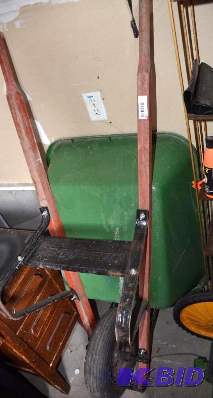 lot 49 image: True Temper wheel barrow - the green plastic ...