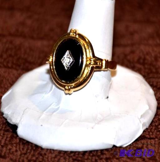 lot 9A image: 24k Gold Diamond ring- it tested positive for...
