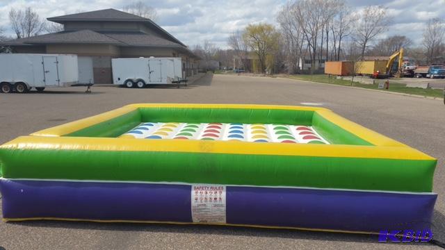 lot 5 image: Twister inflatable, great interactive game fo...