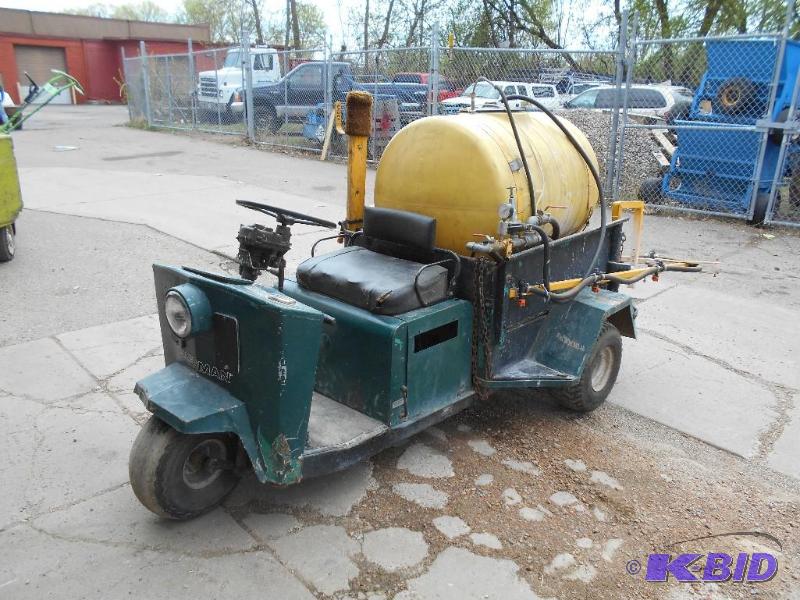 lot 4 image: Cushman Truckster with 100 Gallon Sprayer.