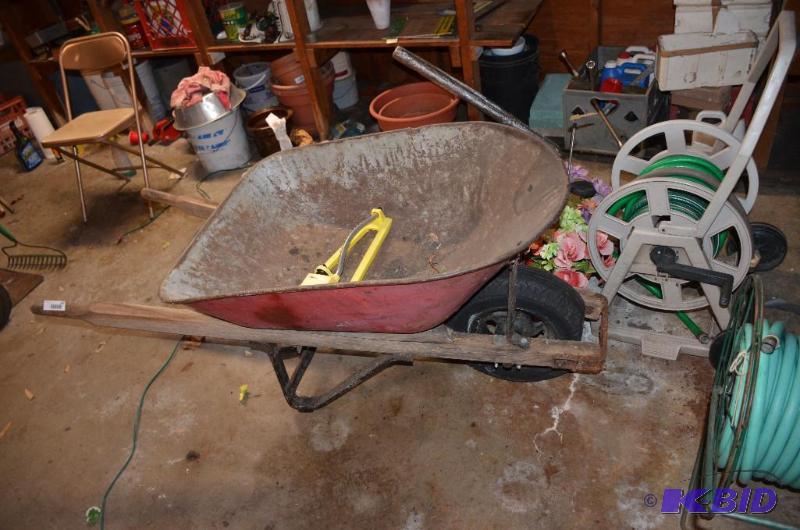 lot 100 image: Wheel barrow with metal bed 25x38"...