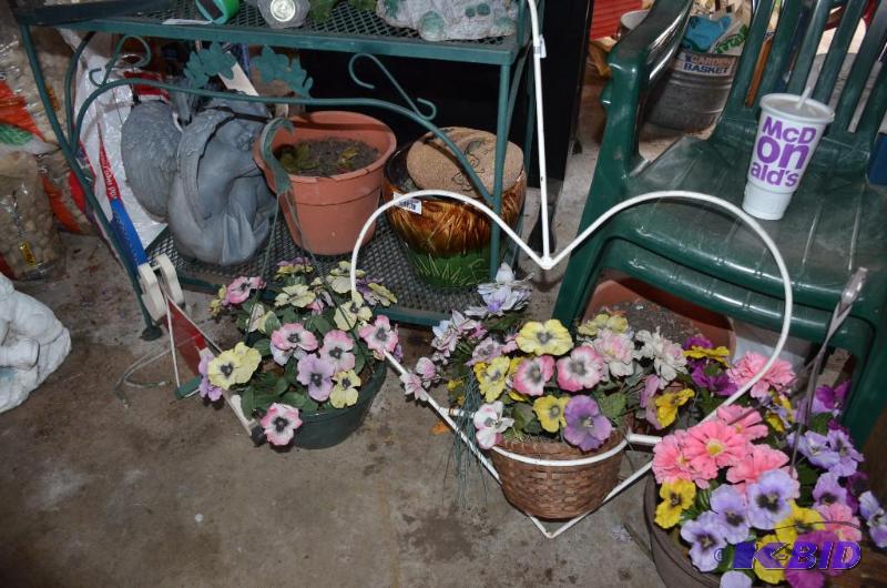 lot 106 image: Heart shaped wrought iron plant stand 36"...