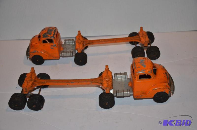 lot 119 image: 2 matching BUDDY L Trucks with trailers. Migh...